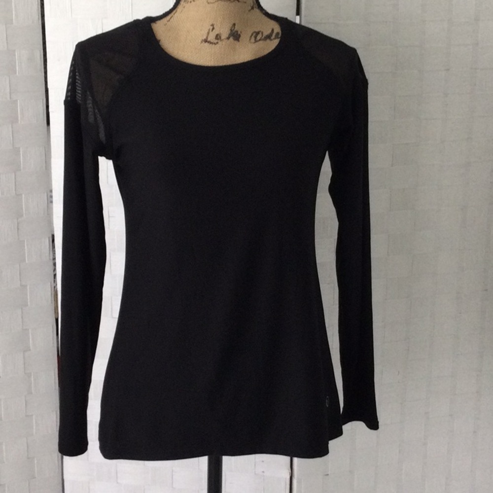 Woman’s top by Vogo size M long sleeves color black washable #454